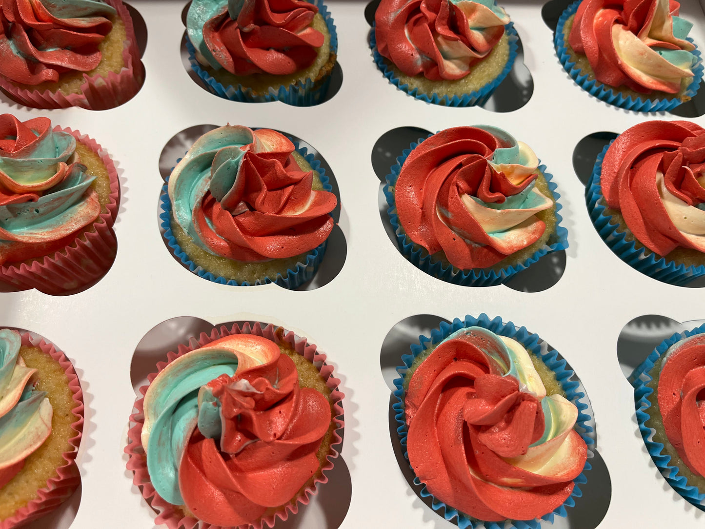 3 coloured swirl cupcakes